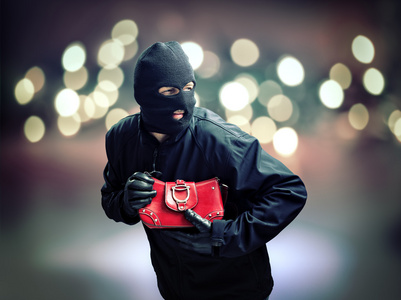 被遮蔽的脸贼偷女人手提包照片