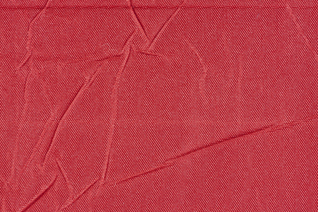 背景或纹理的红色折叠的面料特写