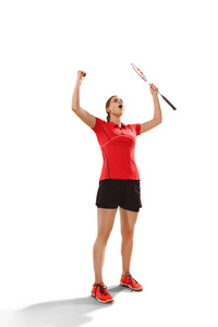 年轻女子羽毛球运动员作为优胜者摆在白色背景
