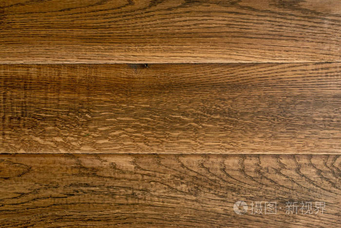 美丽的老式棕色木质背景.旧漆的木桌表面.