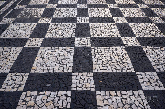 马赛克瓷砖路面模式在街道和广场的丰沙尔马德拉葡萄牙