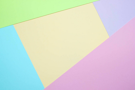 时尚粉彩彩色纸平躺顶视图, 几何背景纹理, 粉红色, 紫色, 黄色, 米色, 绿色和蓝色