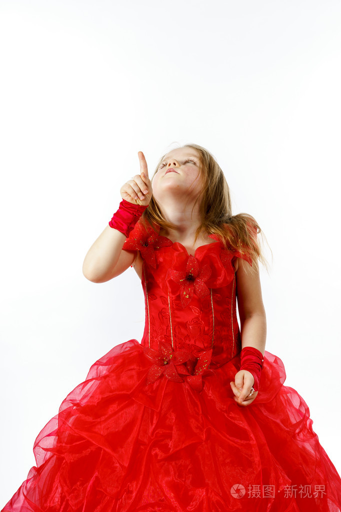 可爱的小女孩穿着红色构成在工作室