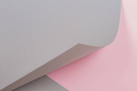 抽象几何形状灰色和粉红色的彩色纸张背景