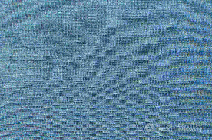 蓝色亚麻织物纹理表面特写作为纺织品背景