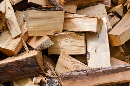 木制碎原木的质地粘在炉子上。的背景