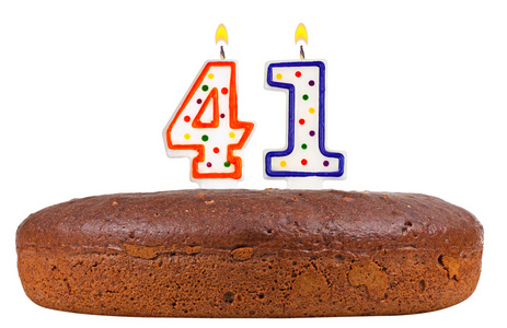 点着蜡烛的生日甜点点着蜡烛的生日蛋糕数字四十一照片
