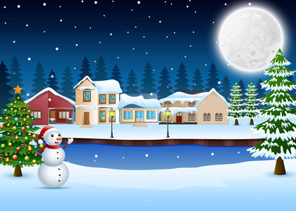 夜冬天村庄风景与圣诞树和雪人
