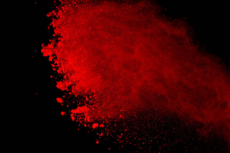 黑色背景红色粉末爆炸的摘要.红色粉末 splatted 隔离.彩色云.