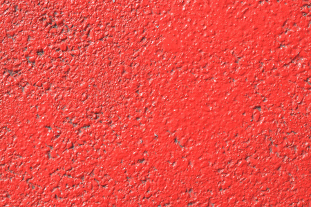 红色油漆沥青质地。彩色道路表面背景