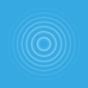 透明的水滴环.在蓝色背景上隔离的环形声波照片