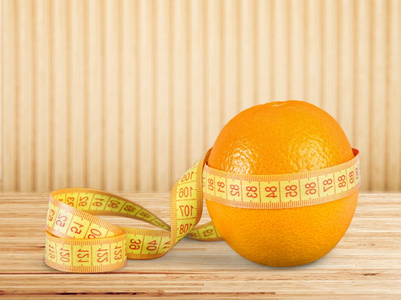 鲜橙色与测量卷尺