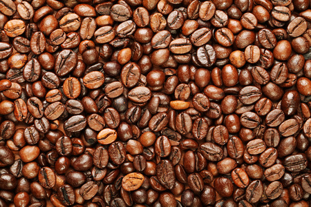褐色咖啡豆咖啡豆为背景的特写和