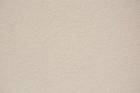 石膏背景墙米色石膏墙纹理背景照片