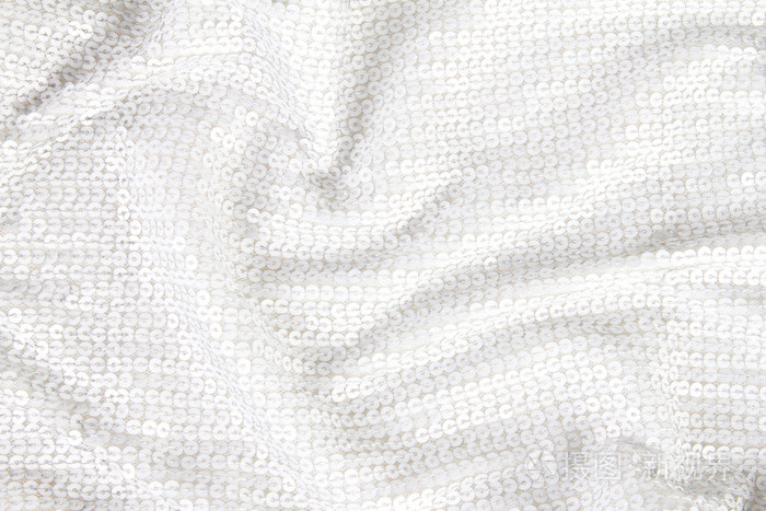 从白色闪亮亮片纺织的抽象背景