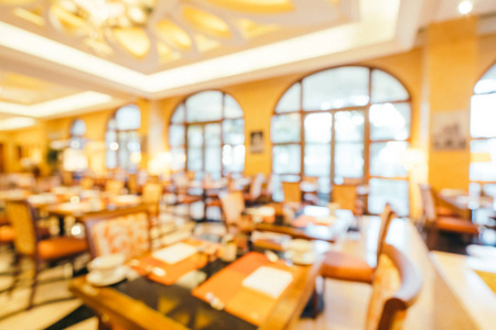 抽象模糊和弥散早餐自助餐在旅馆餐馆和咖啡馆内部为背景