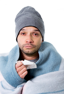 生病的年轻人有温度流行性感冒烟流感病毒感染着鼻涕的鼻子照片