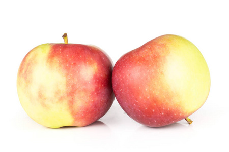 小组的两个整体脸红新鲜红苹果詹姆斯悲伤的品种在白色背景下隔离照片