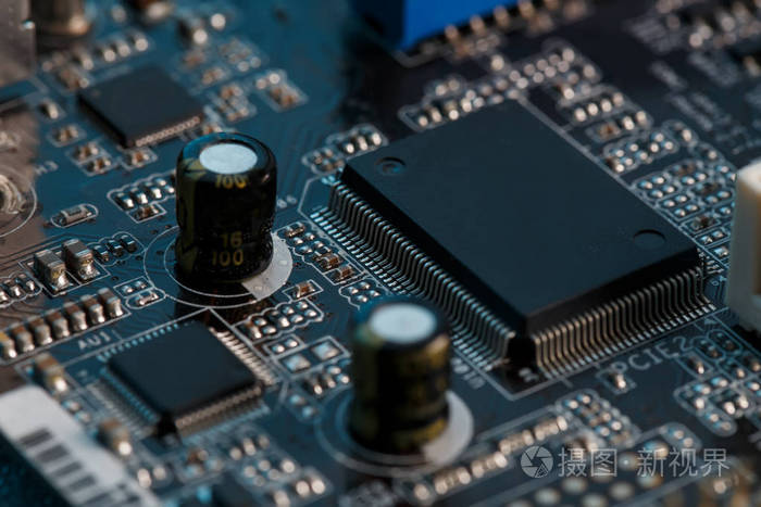 电子电路板关闭.处理器,芯片和电容器.内部计算机照片-正版商用图片0a