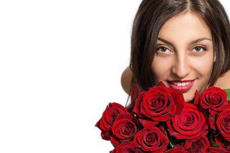 一个漂亮的女孩与一束玫瑰的肖像