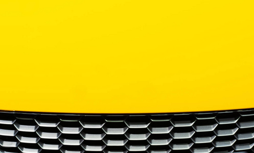 黑色蜂巢图案黄色汽车罩的抽象