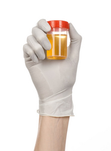 医疗主题 医生的手中抱着一个透明的容器与尿液分析的白色背景上的白手套