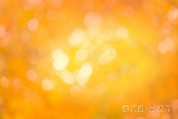 金色抽象的背景与 bokeh 灯。圣诞节和新年快乐模糊的博克背景