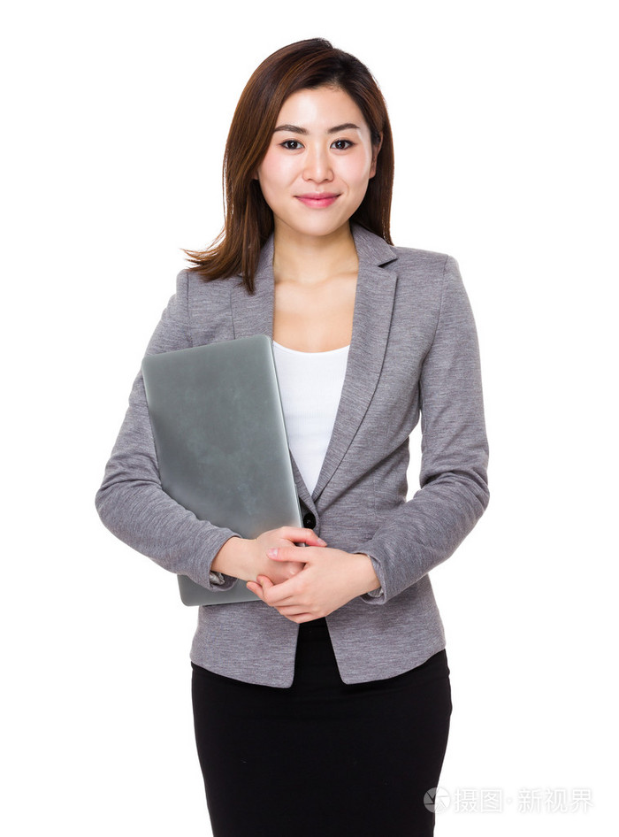 亚洲女商人在灰色的西装