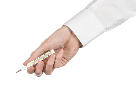 医疗主题 手持温度计测量温度的白色背景上病人的医生的手