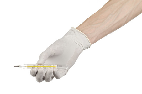 医疗主题 医生的手在手持温度计测量温度的病人在白色背景上的白色手套
