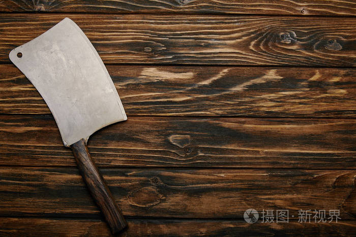 木背景上的屠刀的顶部视图