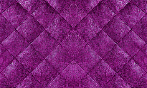 紫色的支柱关闭紫色绗缝的皮革面料关闭,抽象背景照片
