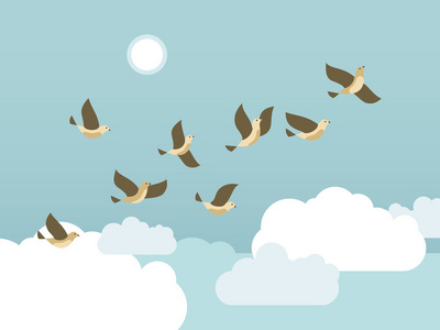 凌霄花和鸟儿鸟儿飞翔在蓝色的天空和云彩和太阳照片