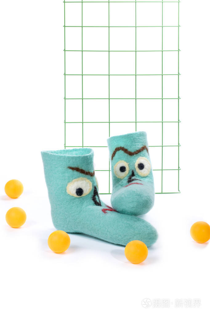 青色毛毡袜子与在白色背景的样式
