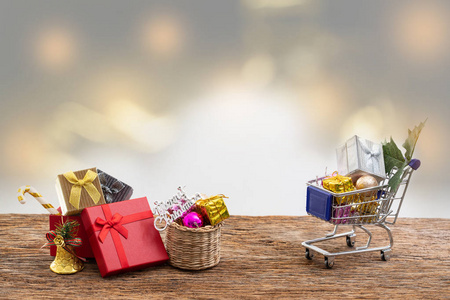 购物车礼品礼物盒与彩色丝带在白色背景圣诞节生日特别场合