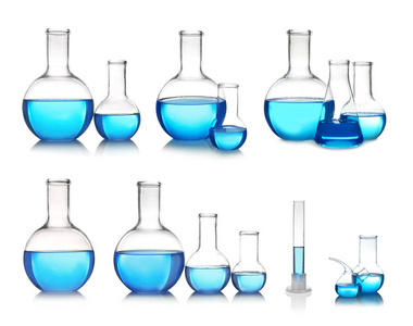 设置与不同的实验室玻璃器皿和液体在白色背景上分析