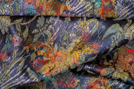 组织 纺织 布 面料 材质。纺织塞满了蓝色的花朵。布，通常由机织或针织纺织纤维