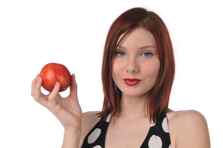 年轻女子拿一个苹果
