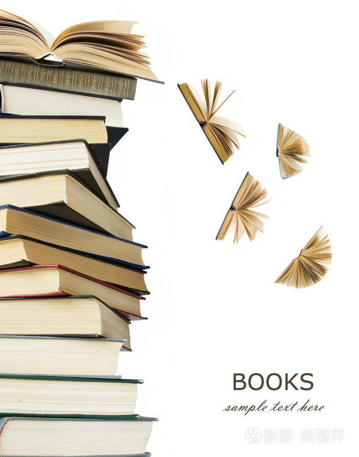 书桩与打开的书籍,飞走了孤立的白色背景上.教育理念