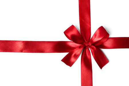 在白色背景上闪亮红色缎带照片