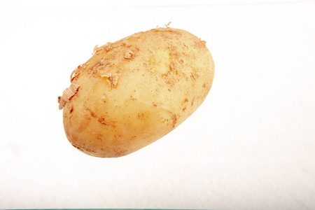 生赤褐色土豆堆叠在一起新鲜有机马铃薯全新的马铃薯块茎白色背景的小