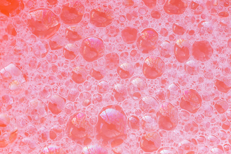 粉红色背景摘要摘要的粉红色泡沫为背景照片