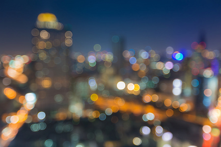 与 abangkok 城市夜间景观的散景模糊抽象背景