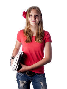 年轻女青少年学生携带书籍超过一个白色的背景