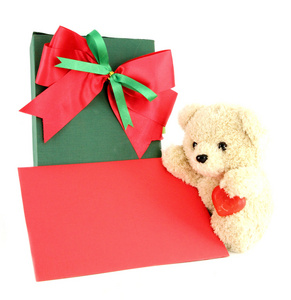 泰迪熊和卡片和白色背景上的礼物