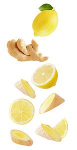 分离的飞行果子。在白色背景下落下的柠檬和生姜以裁剪路径为包装设计元素和广告