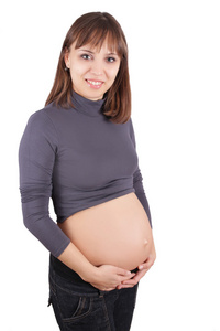 怀孕的女人控股肚皮