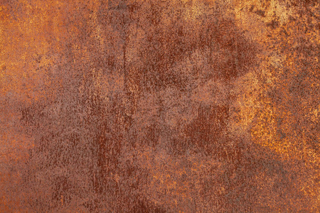 生锈的黄红色纹理金属表面.金属板材的质地易受氧化和腐蚀.