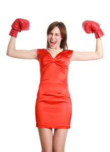 女人在红色，戴着拳击手套 孤立在白色