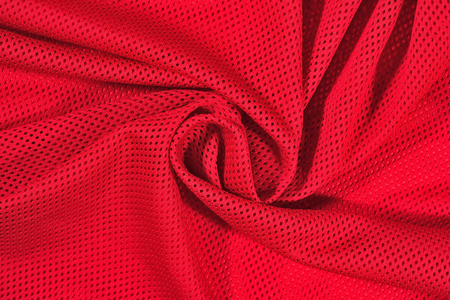 红色皱巴巴的非织造的布背景图片